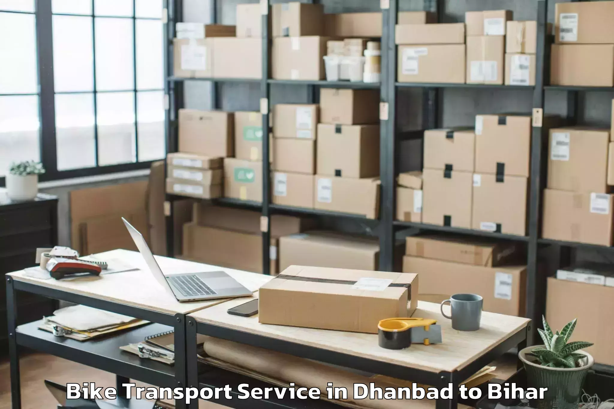 Comprehensive Dhanbad to Akorhi Gola Bike Transport